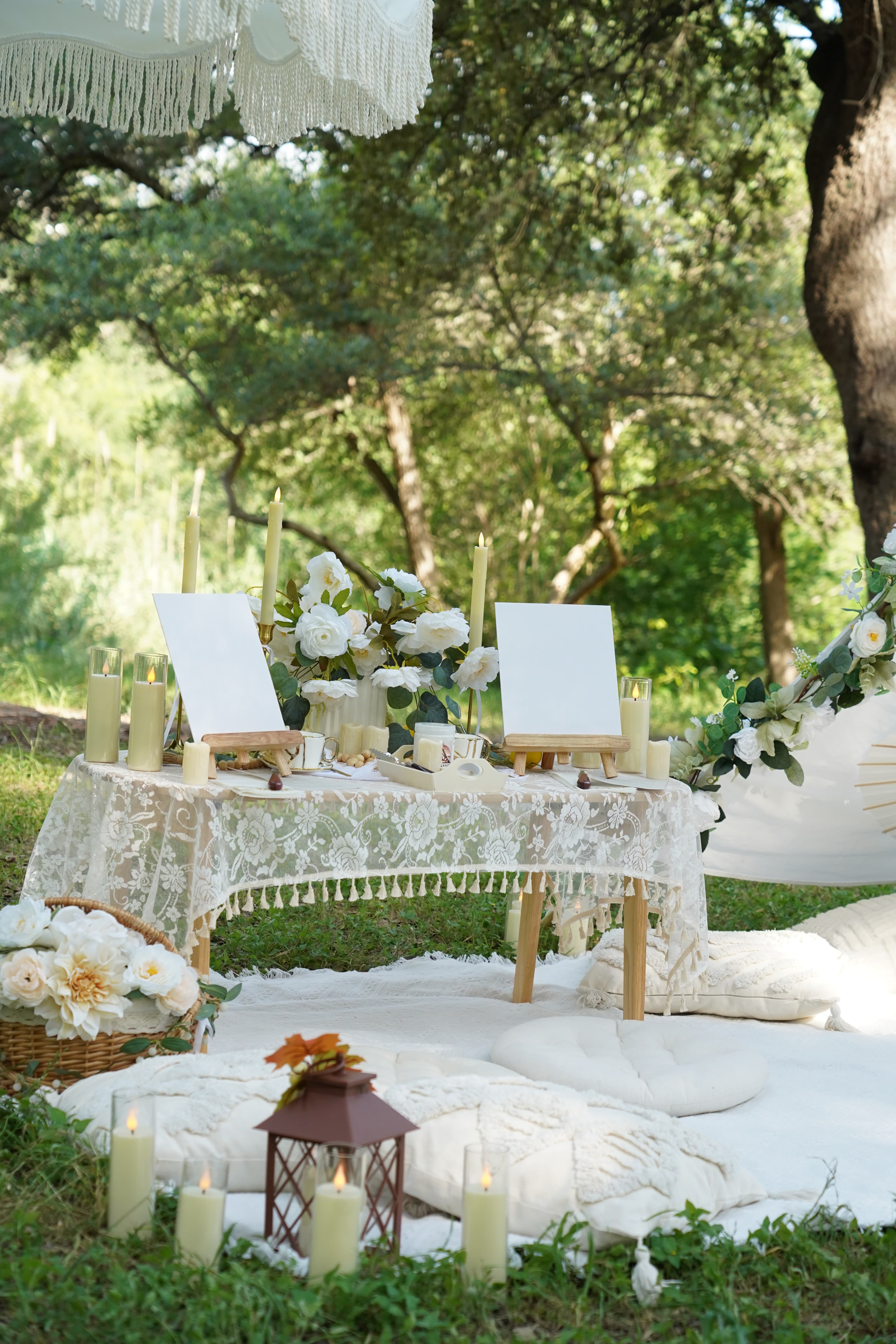Styled boho picnic setup with lace table and candles in Austin